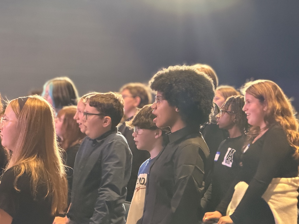 a picture of students singing