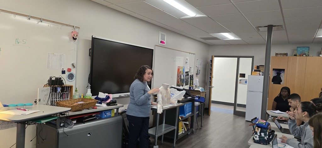 a guest speaker talking with students