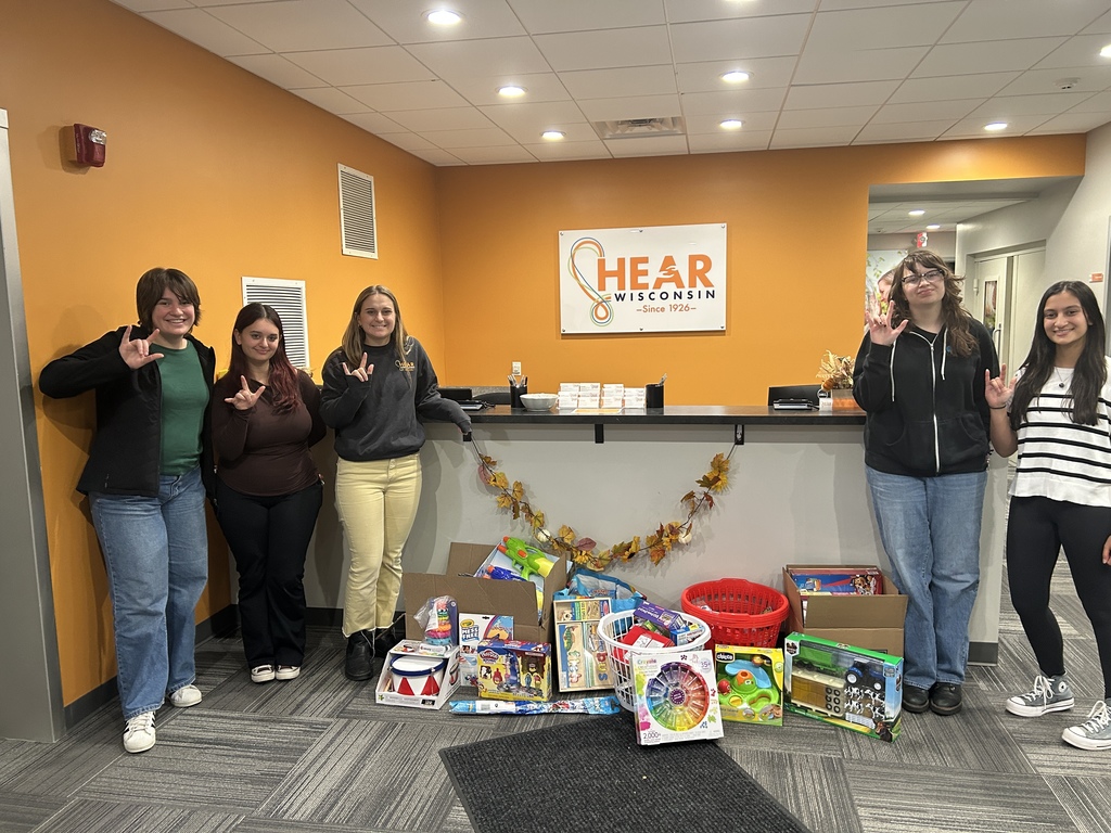 students saying hi in sign language