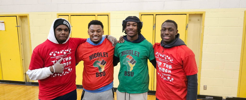 a picture of students smiling for a picture