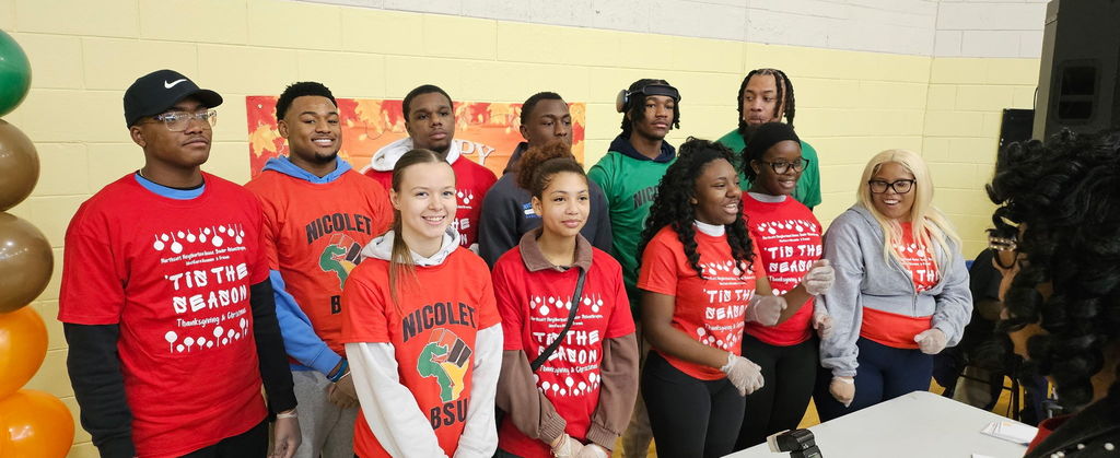 a picture of students smiling for a picture