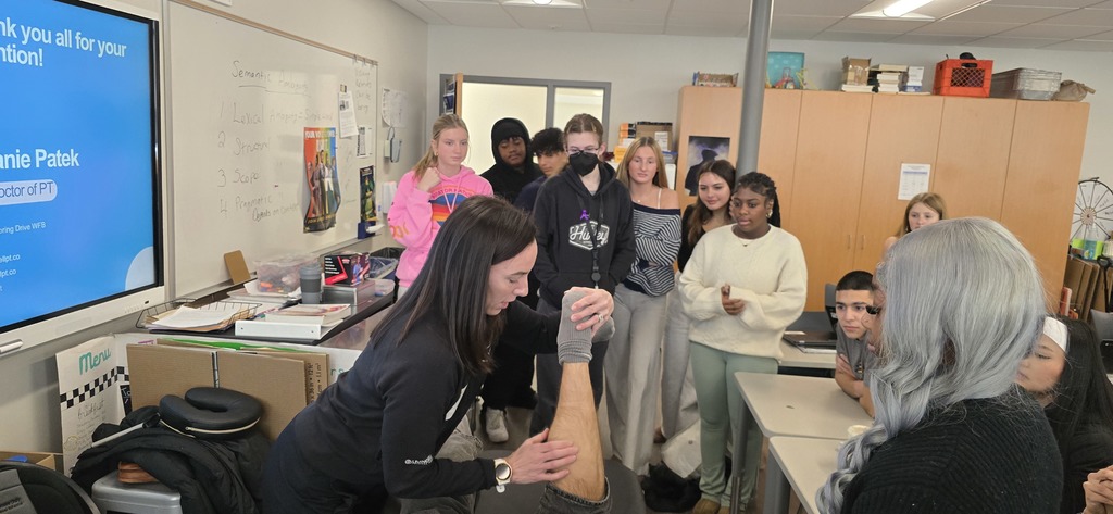 a picture of a physical therapist working on a patient