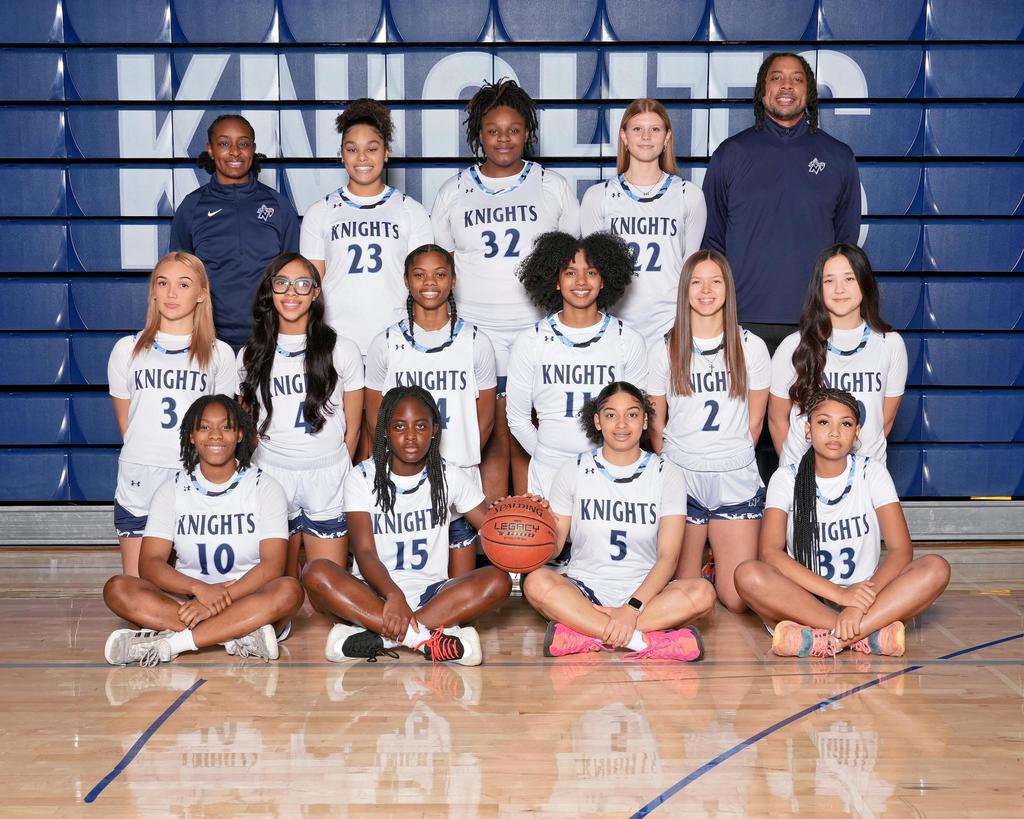 a picture of basketball players smiling for the camera