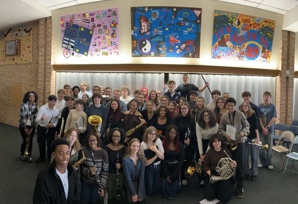 a picture of music students smiling for a picture