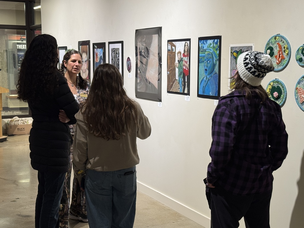 students talking about art pictures