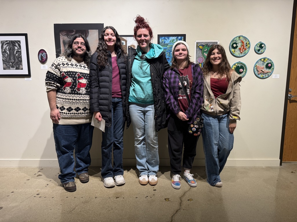 a picture of art student smiling for the camera