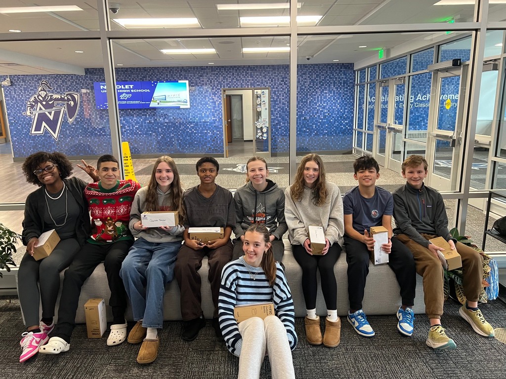 a picture of students smiling for a picture