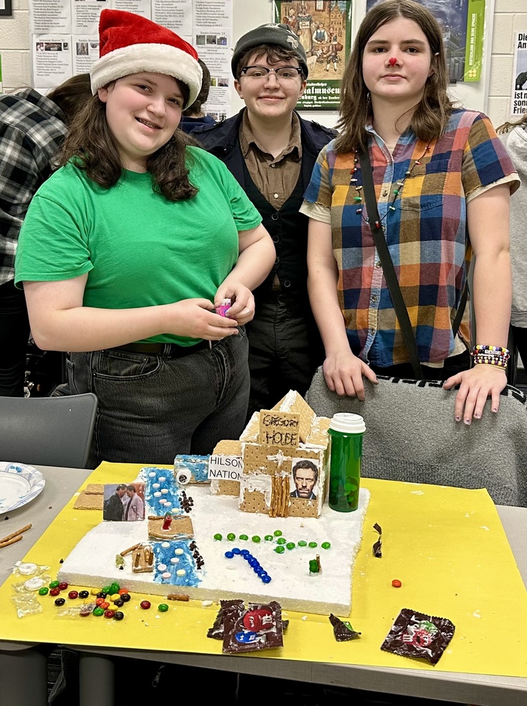  a picture of students making a gingerbread house