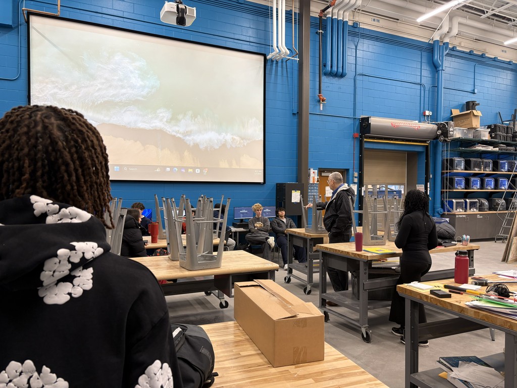 a person talking to a class