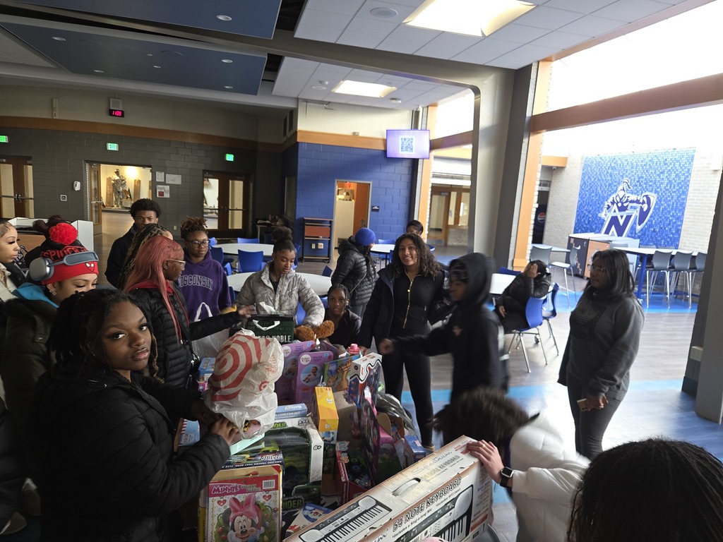 a picture of students organizing toys