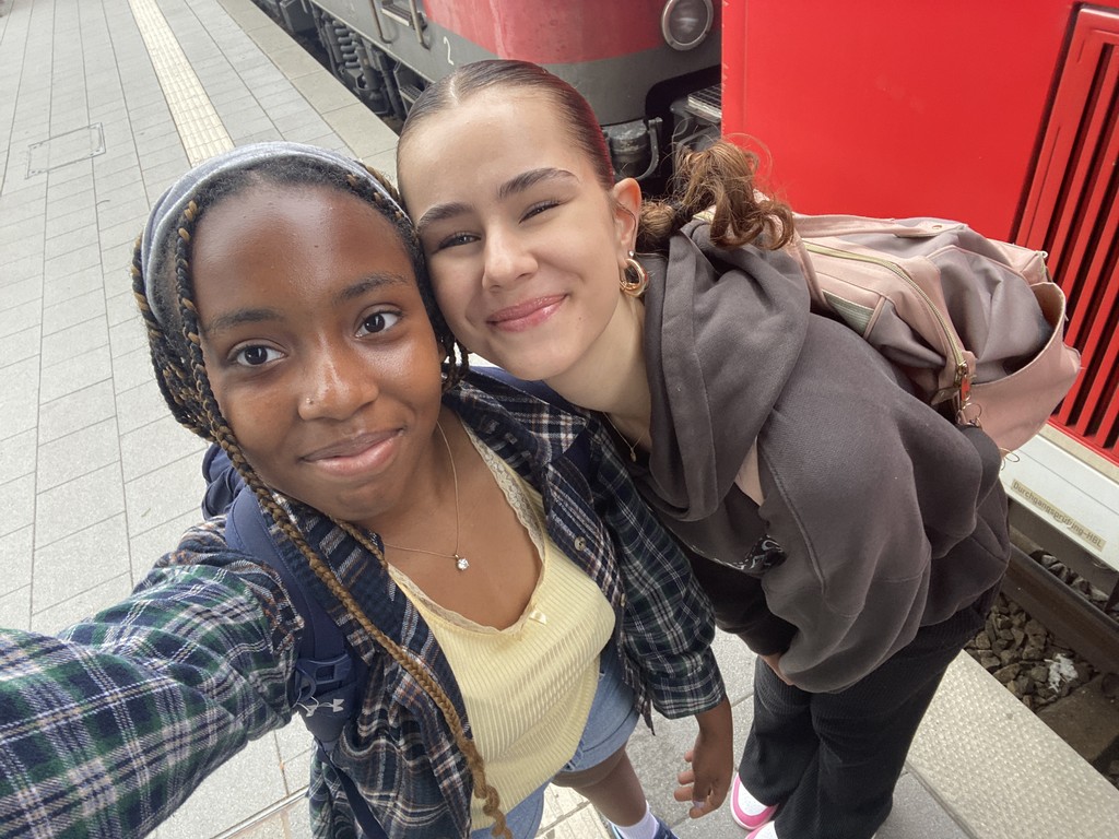 a picture of two girls smiling