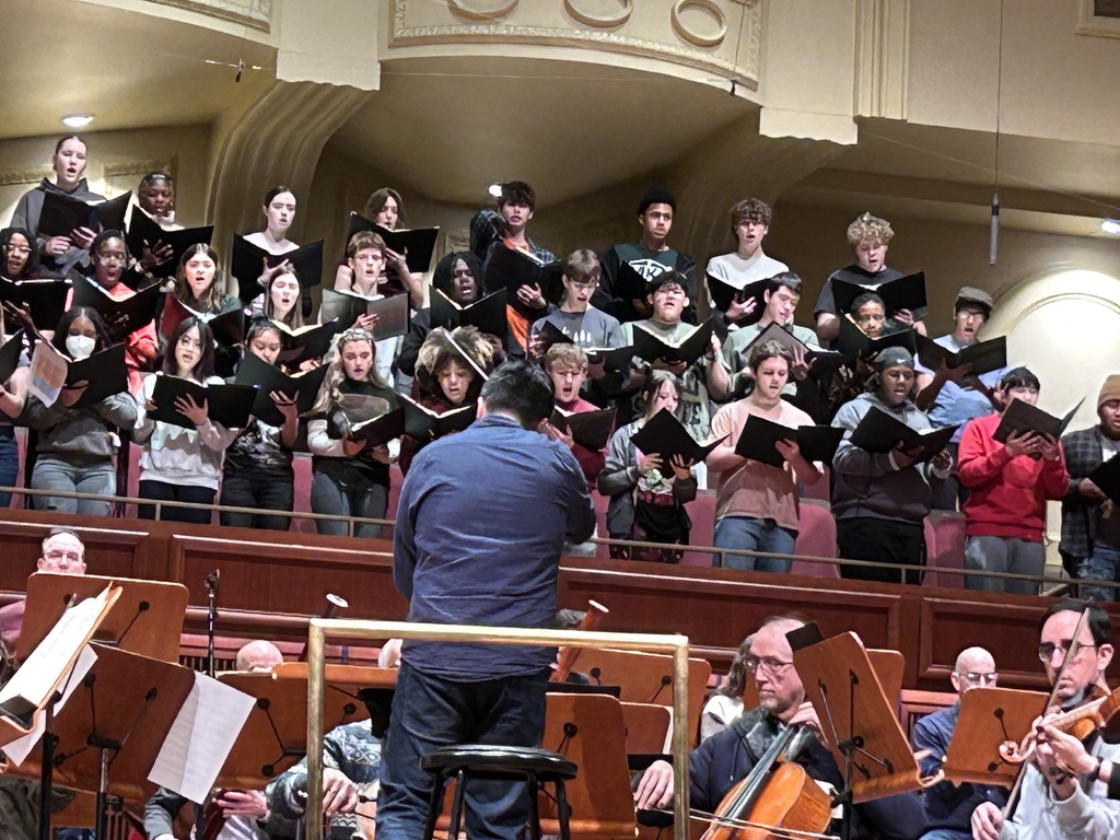 students signing a song
