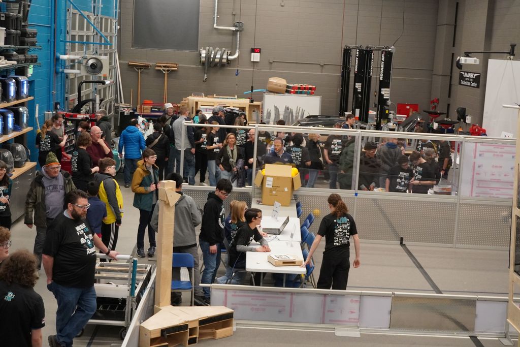 community walking through the tech ed area