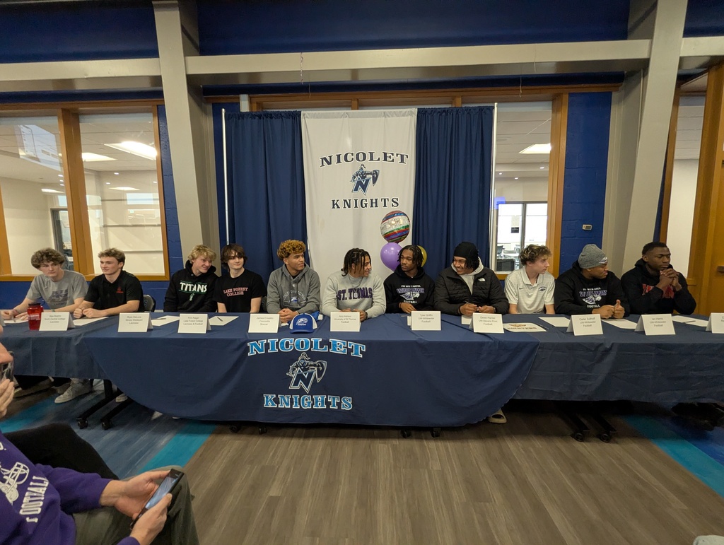 a picture of students smiling for a picture