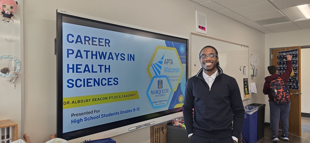 a presenter smiling for a picture