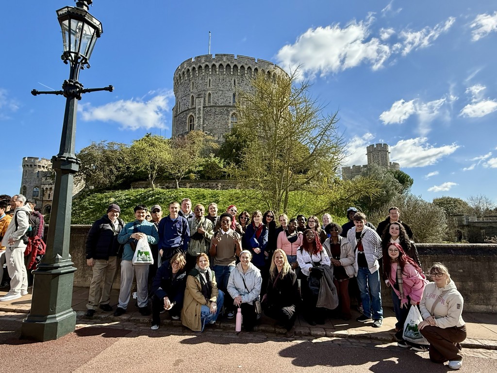 students in front of castle