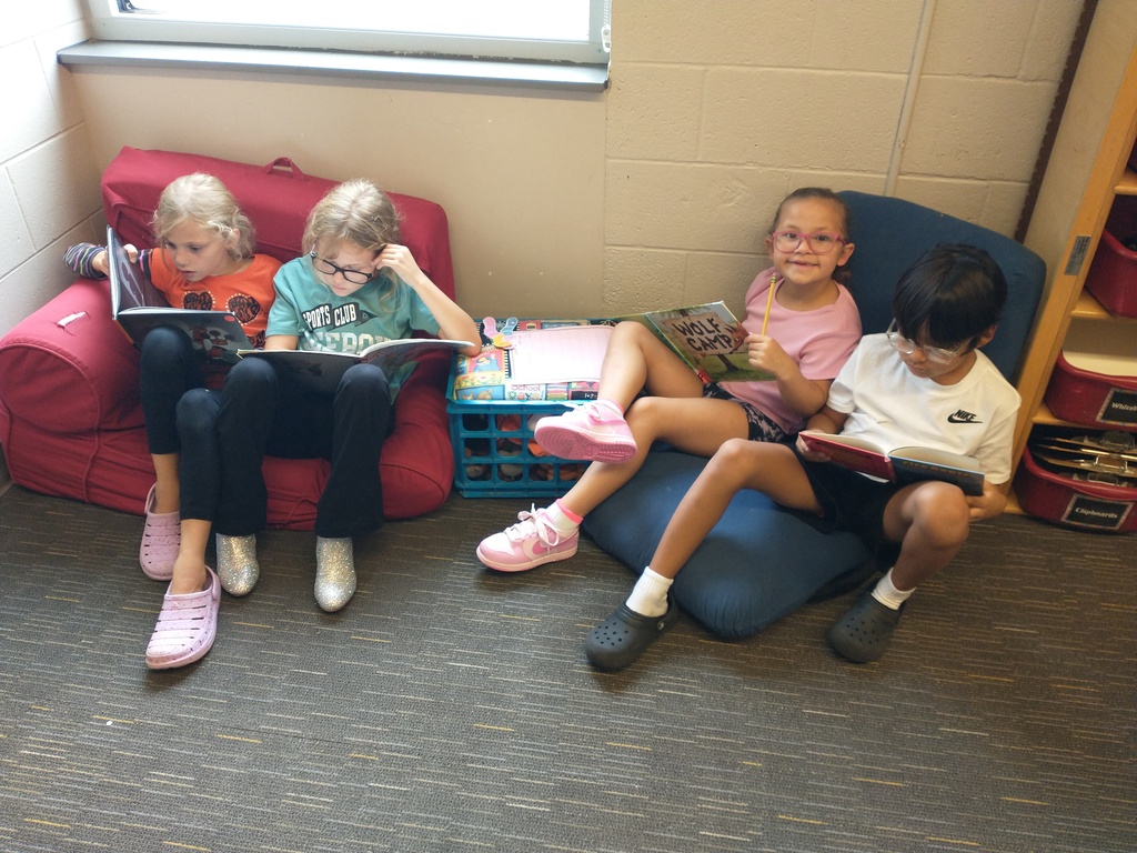 Children reading books. 