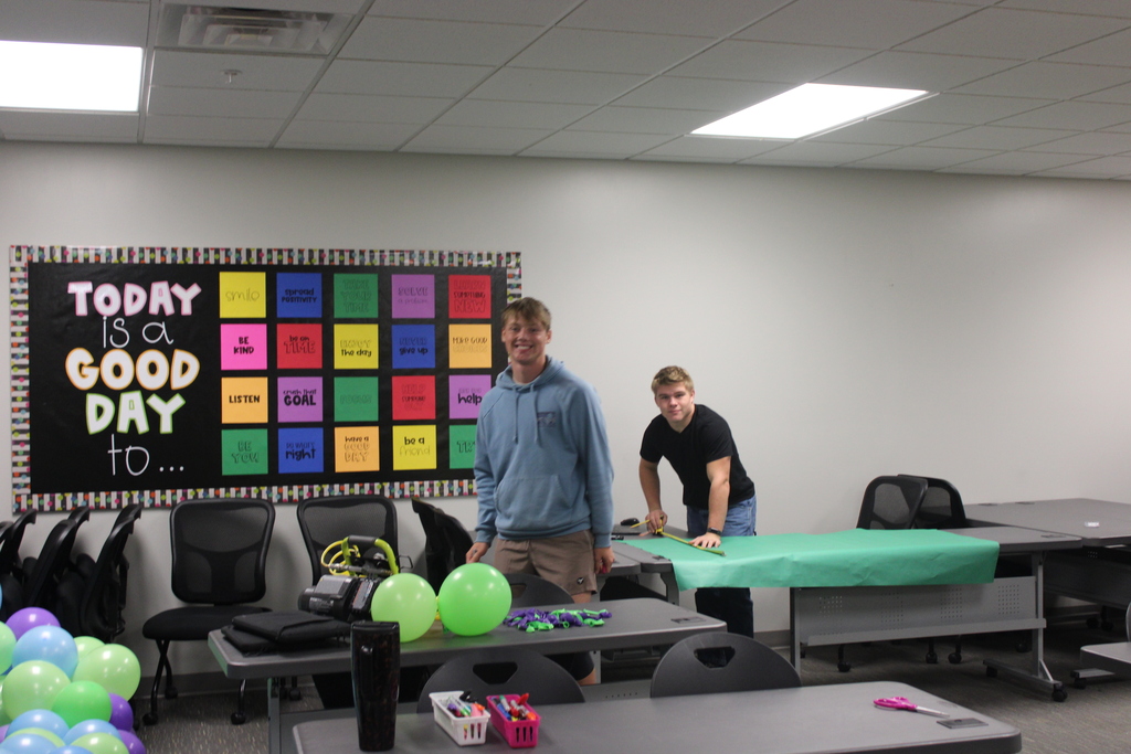 a couple seniors working hard