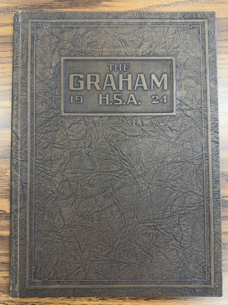 Brown leather yearbook cover that says "The Graham H.S.A. 1924."