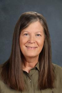 Portrait of teacher being recognized in post