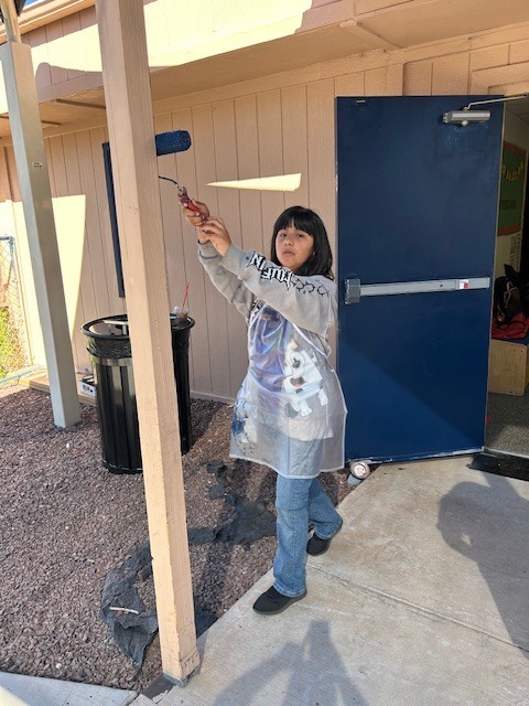 student painting