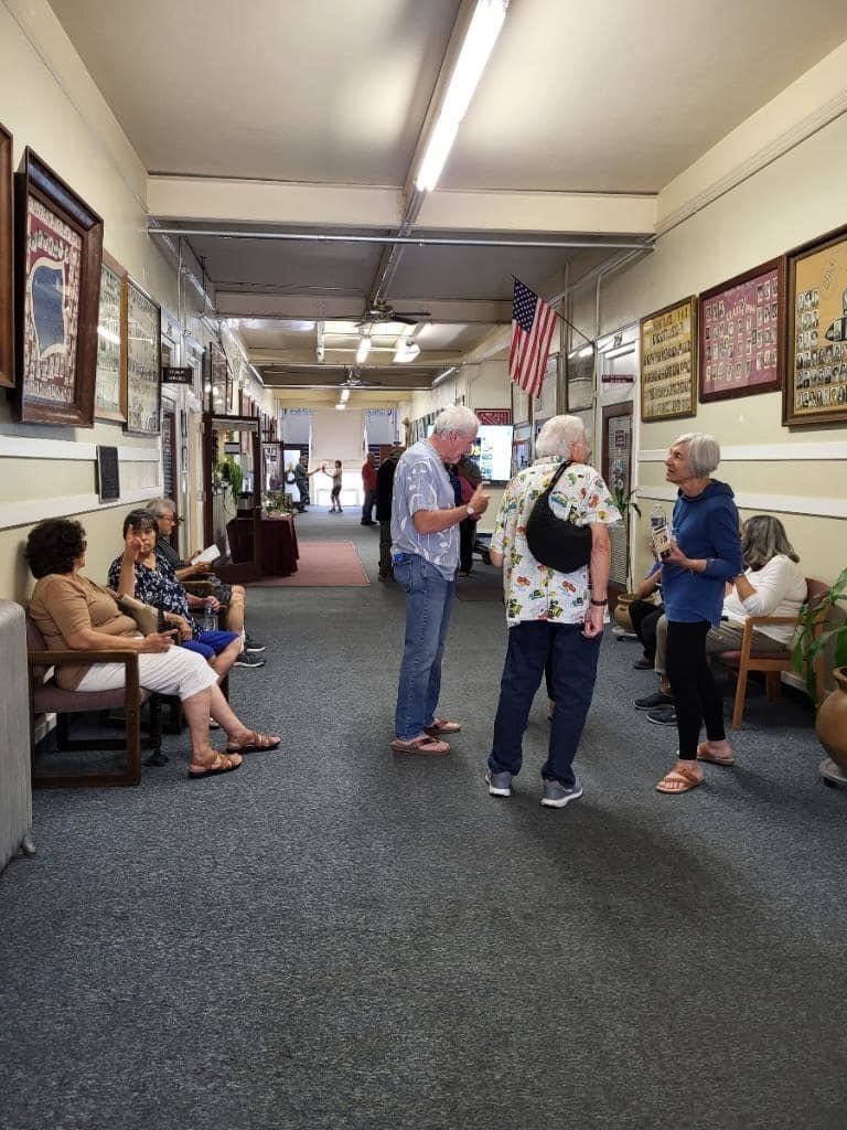candid shot of alumni in district