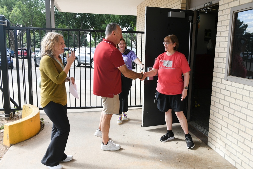 Various images of Ms. Lisa Bischoff being named Magic 104.1’s Teacher of the Month