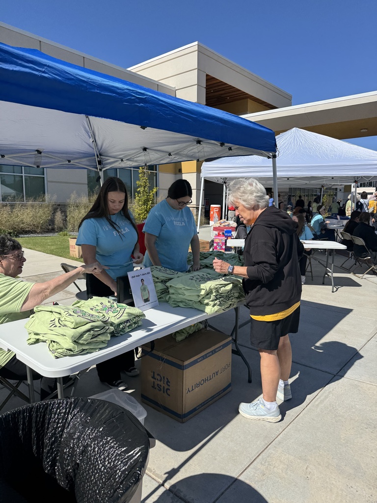 Various images of Norman North FCCLA members volunteering at the annual Cleveland County CROP Walk