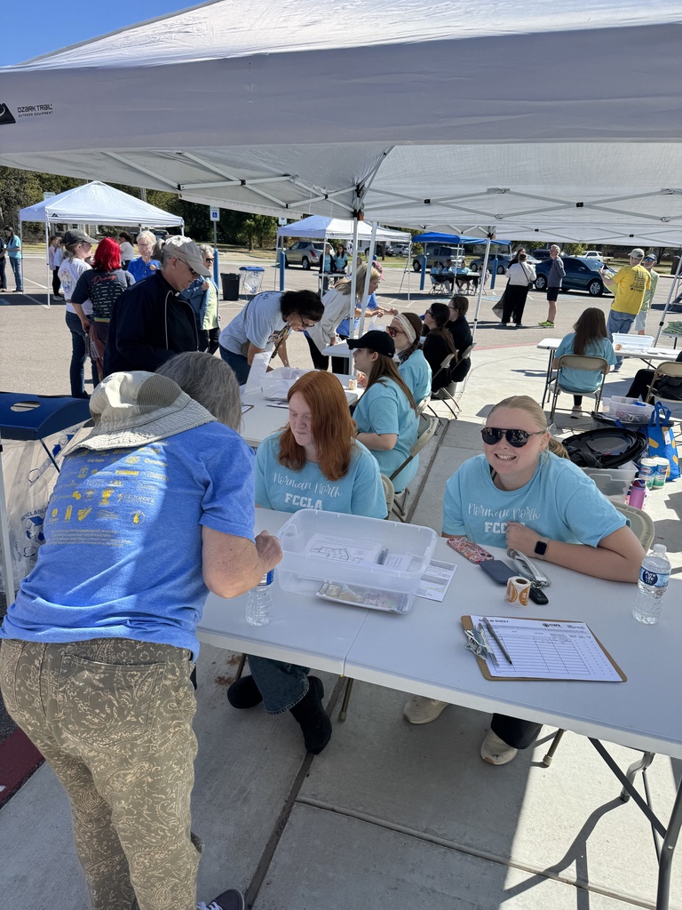 Various images of Norman North FCCLA members volunteering at the annual Cleveland County CROP Walk