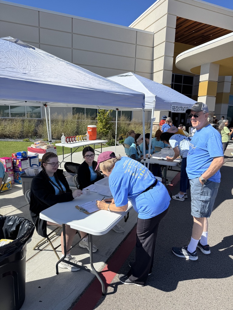 Various images of Norman North FCCLA members volunteering at the annual Cleveland County CROP Walk