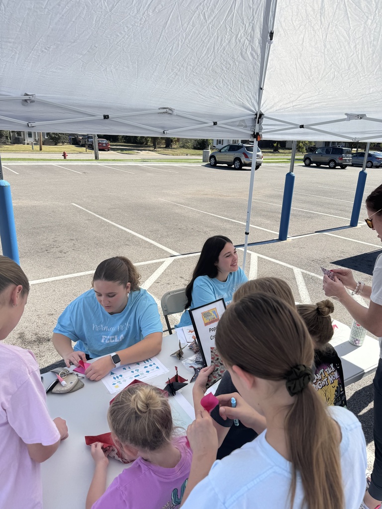 Various images of Norman North FCCLA members volunteering at the annual Cleveland County CROP Walk