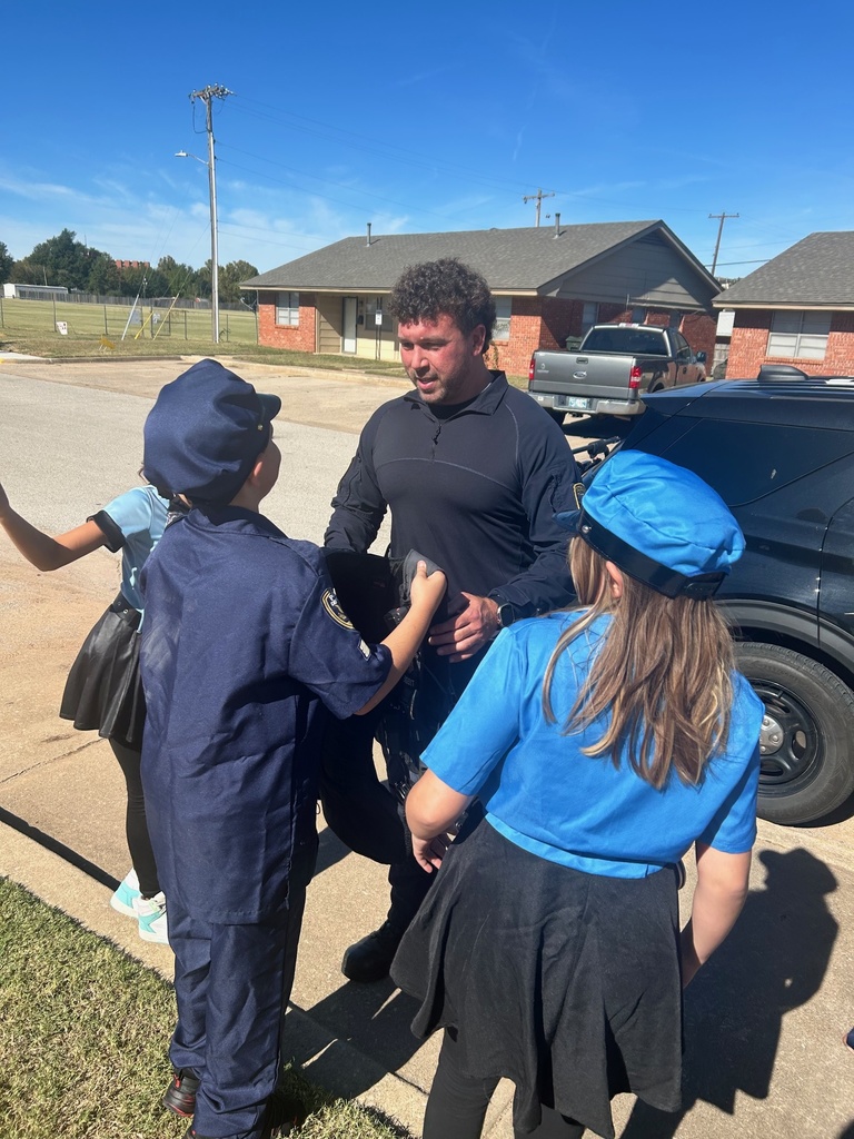 Various photos of Madison Elementary students and SRO Rodney Brueggert.