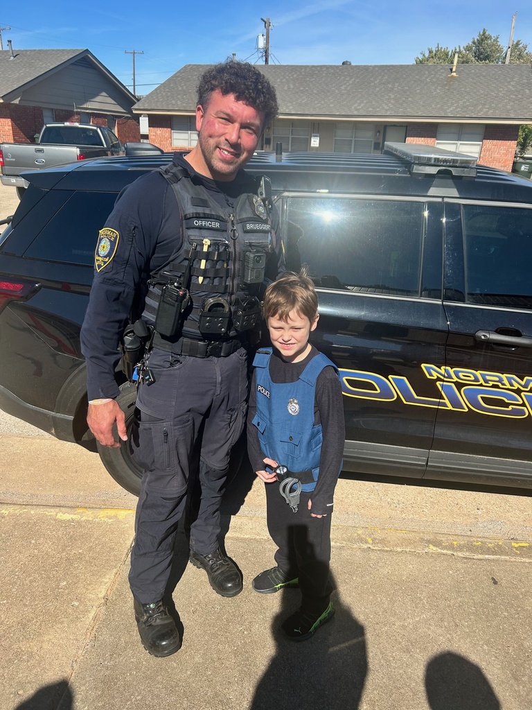 Various photos of Madison Elementary students and SRO Rodney Brueggert.