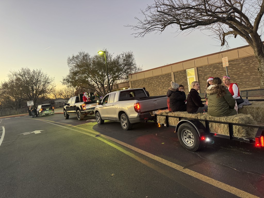 Various photos of Kennedy Elementary caroling.