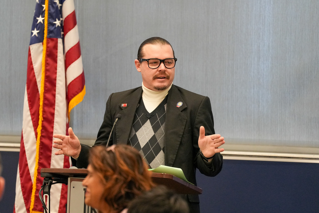 Various photos from the mayor's interfaith breakfast.