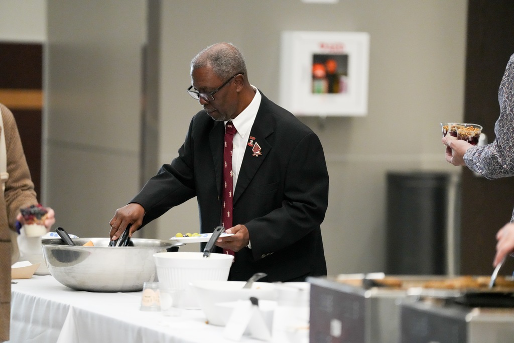 Various photos from the mayor's interfaith breakfast.
