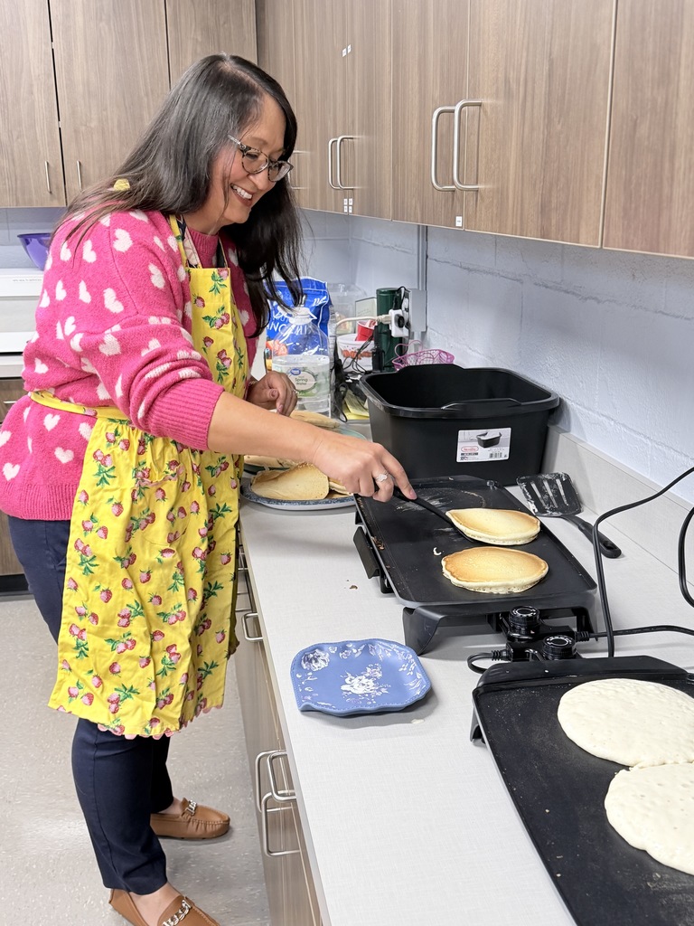 Various photos of Lakeview students having pancakes with the principal.