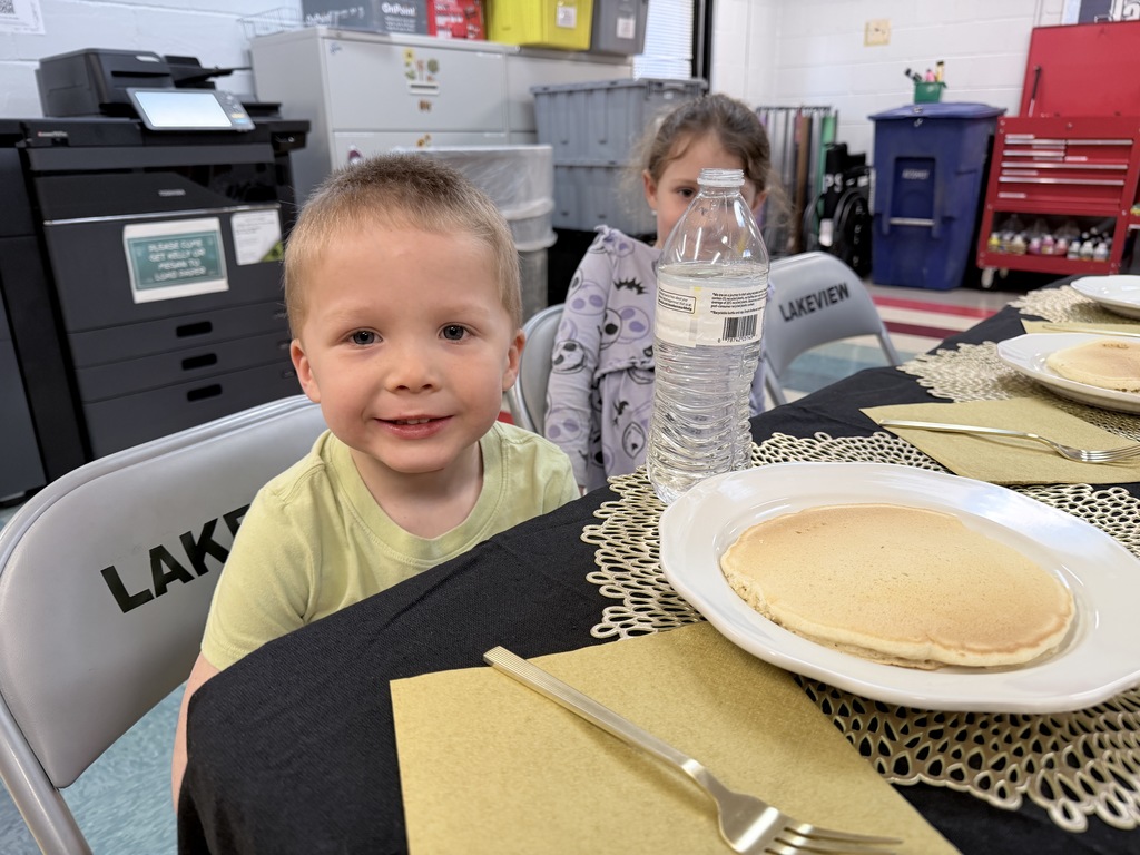 Various photos of Lakeview students having pancakes with the principal.