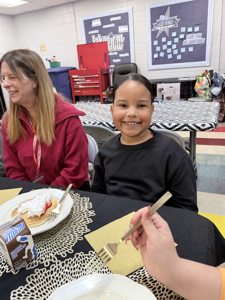 Various photos of Lakeview students having pancakes with the principal.