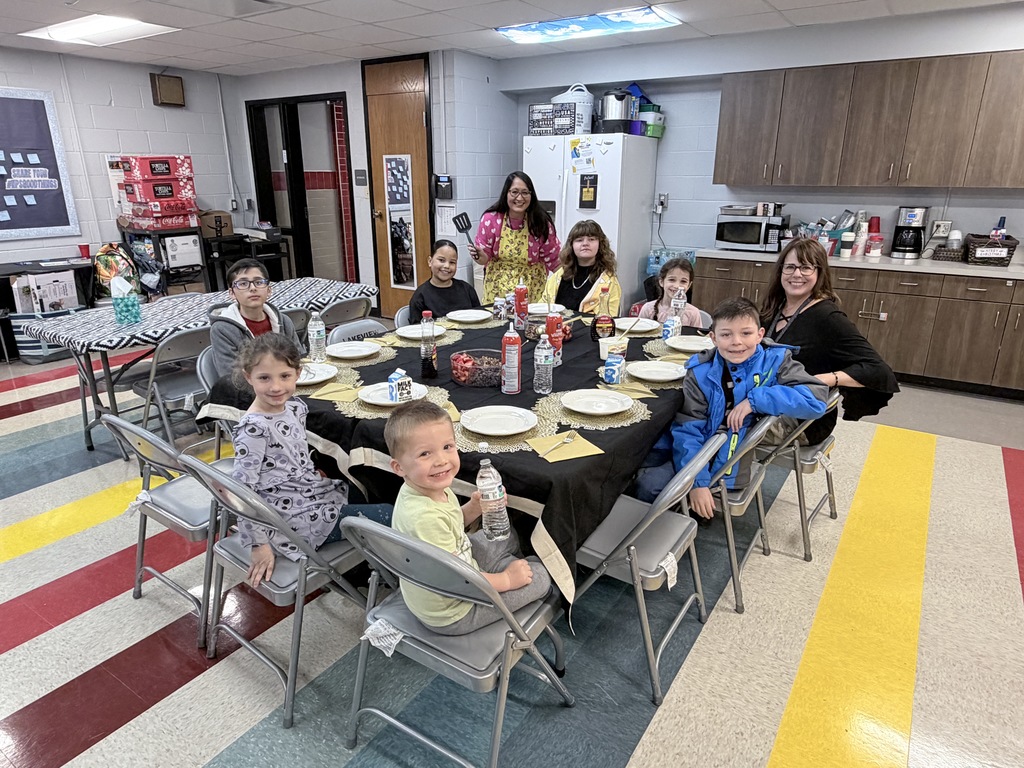 Various photos of Lakeview students having pancakes with the principal.