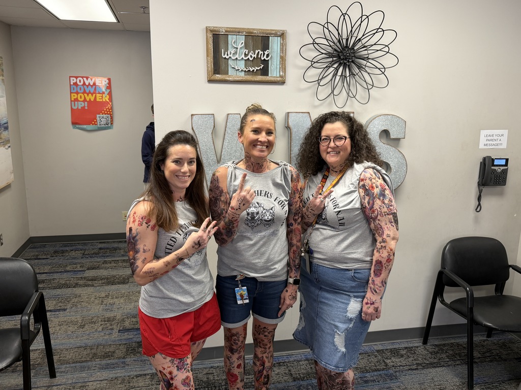 Several photos from Tat the Teacher at Whittier.