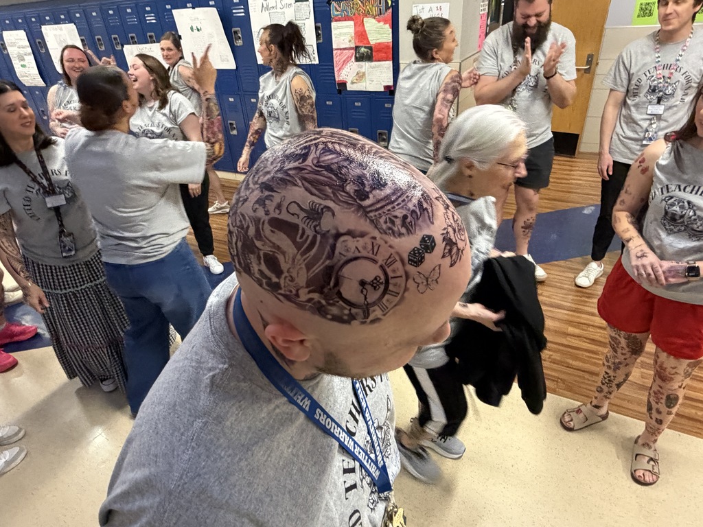 Several photos from Tat the Teacher at Whittier.