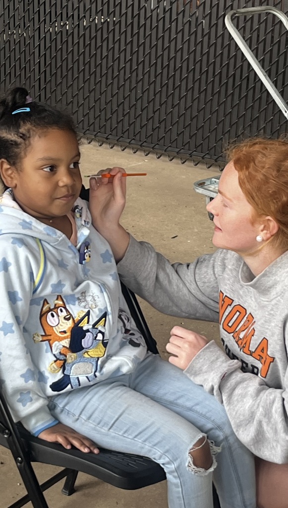 Various photos of NHS cheer helping with special olympics.