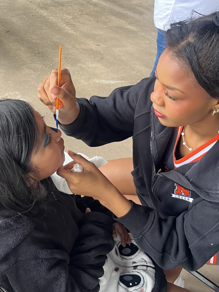 Various photos of NHS cheer helping with special olympics.