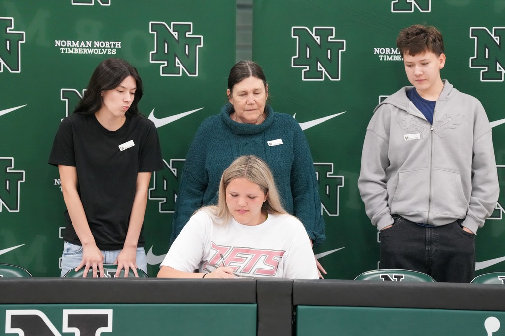 Various photos from Norman North Signing Day