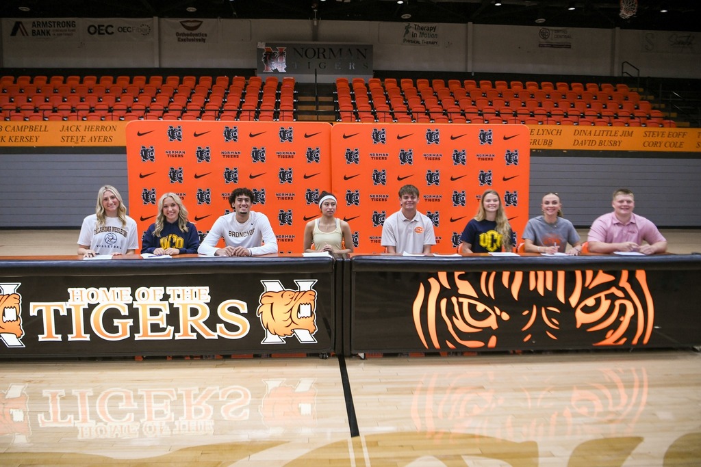 Various photos of Norman High Signing Day