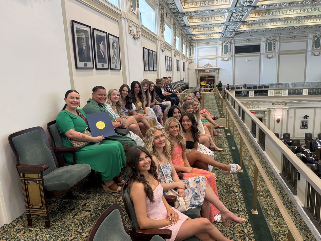 Various photos of Norman North cheer at the Capitol. 
