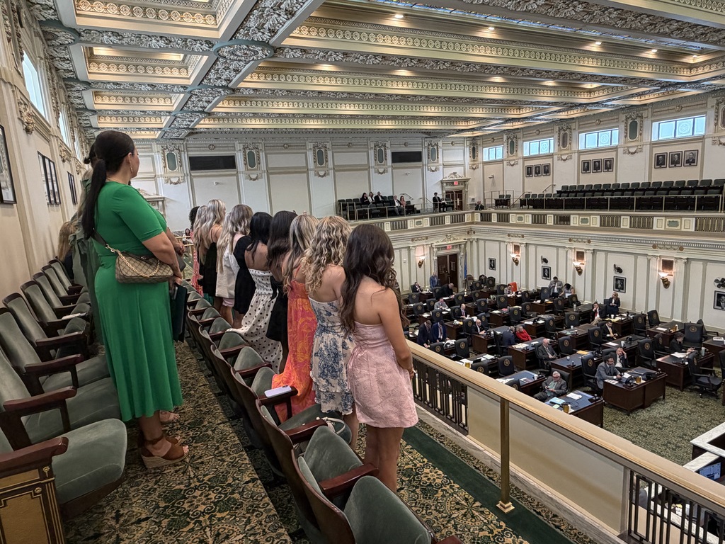 Various photos of Norman North cheer at the Capitol. 