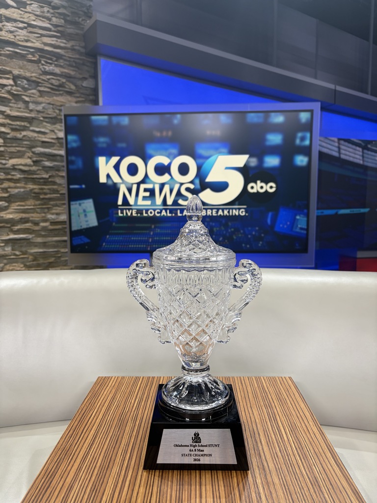 Various photos of Norman North cheer on KOCO