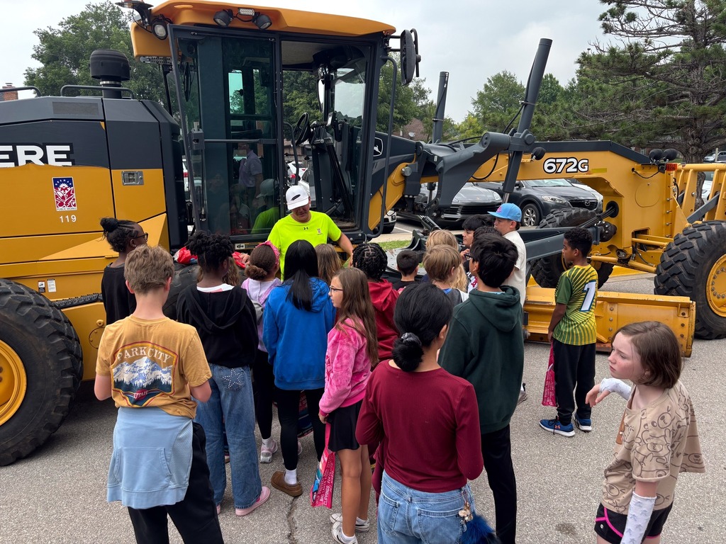 Various photos of City of Norman at Truman Elementary.